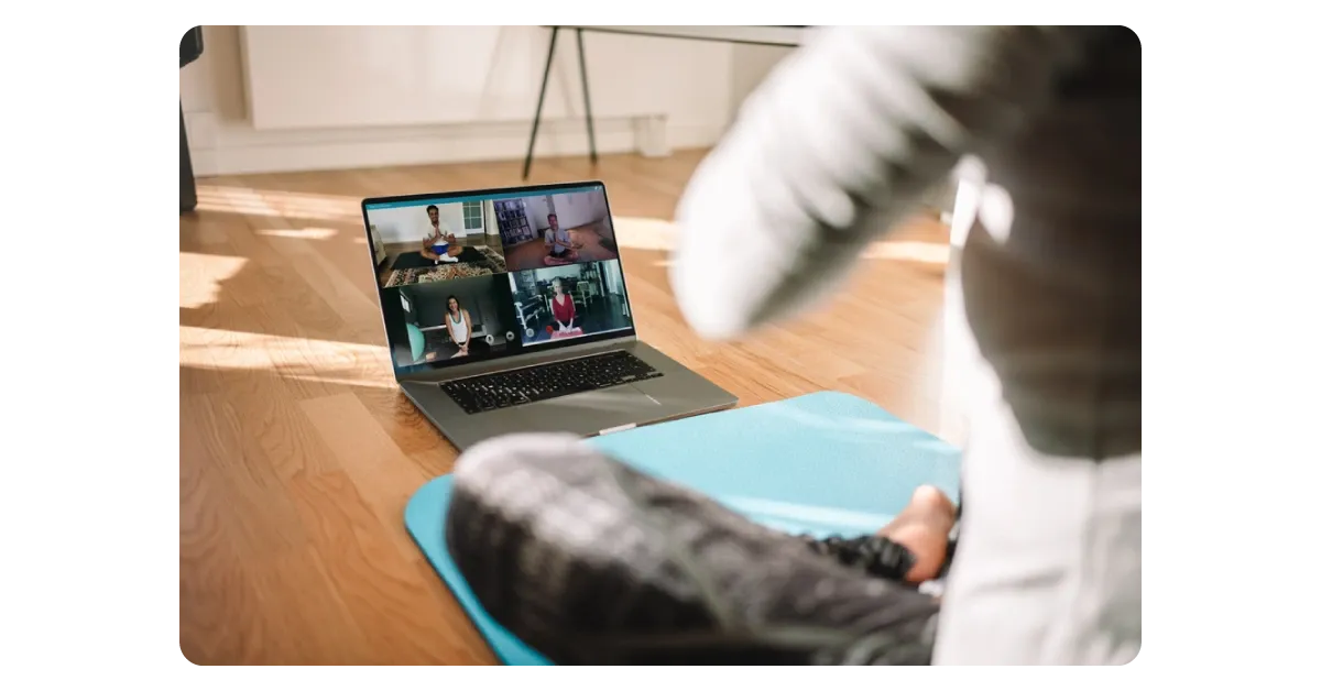 employee attending online yoga class.webp