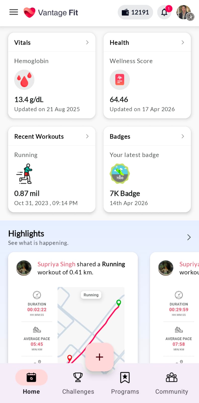 Vantage Fit health profile screen with vitals hemoglobin reading, wellness score, recent running workout, latest seven K badge earned, and team social highlights feed